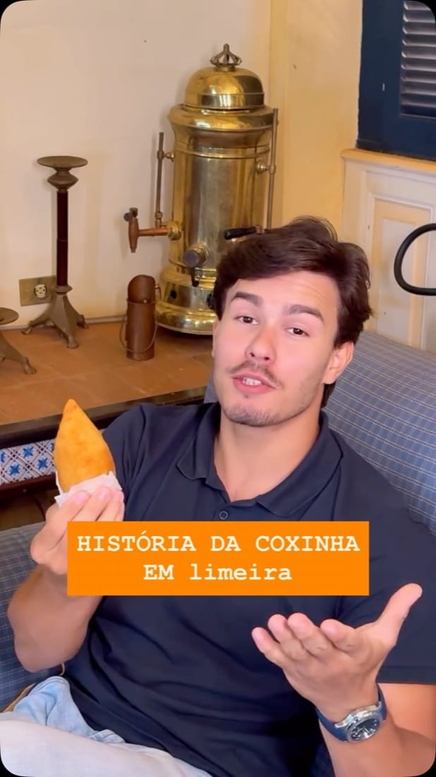 Rapaz segurando uma coxinha com o texto História da coxinha em Limeira, vídeo para a Secretaria do Turismo de Limeira